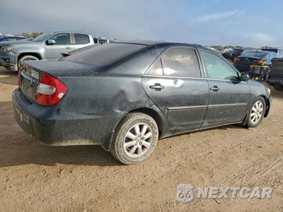 Trzecie zdjęcie samochodu z tyłu: 2002 TOYOTA CAMRY LE VIN:JTDBF32K520024417 - miniatura