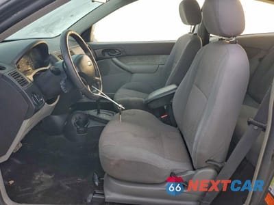 Zdjęcie 7 z 12 samochodu: 2005 FORD FOCUS ZX3 VIN:3FAFP31N65R144070 - miniatura