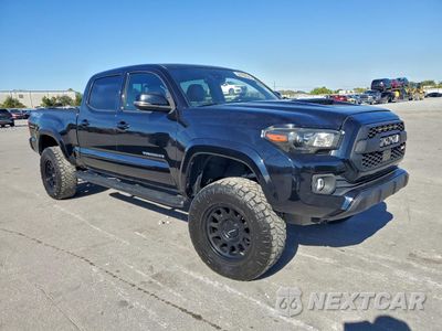 Czwarte zdjęcie samochodu z boku: 2019 TOYOTA TACOMA DOUBLE CAB VIN:3TMDZ5BN5KM064743 - miniatura