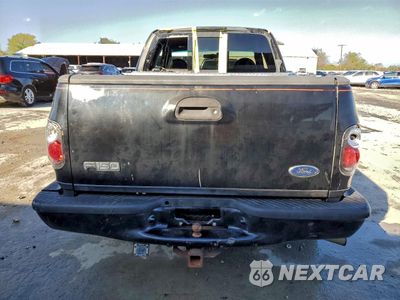 Zdjęcie 6 z 12 samochodu: 2000 FORD F150 VIN:2FTRX07LXYCB16135 - miniatura