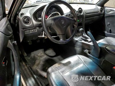 Zdjęcie 8 z 14 samochodu: 1999 MAZDA MX-5 MIATA VIN:JM1NB3532X0102933 - miniatura
