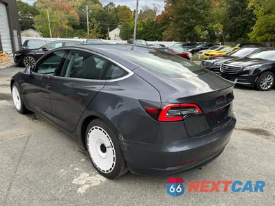 Trzecie zdjęcie samochodu z tyłu: 2018 TESLA MODEL 3 VIN:5YJ3E1EB1JF119421 - miniatura