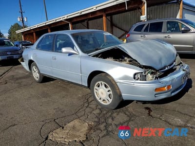 Czwarte zdjęcie samochodu z boku: 1995 TOYOTA CAMRY LE VIN:4T1GK12E3SU077833 - miniatura