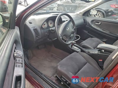 Zdjęcie 8 z 12 samochodu: 2002 NISSAN MAXIMA GLE VIN:JN1DA31D02T445571 - miniatura