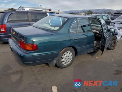 Trzecie zdjęcie samochodu z tyłu: 1996 TOYOTA CAMRY DX VIN:4T1BG12K2TU713497 - miniatura