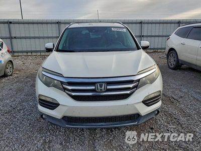 Piąte zdjęcie samochodu w środku: 2017 HONDA PILOT TOURING VIN:5FNYF5H94HB002641 - miniatura