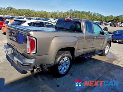 Trzecie zdjęcie samochodu z tyłu: 2015 GMC CANYON SLE VIN:1GTH5BE32F1222187 - miniatura