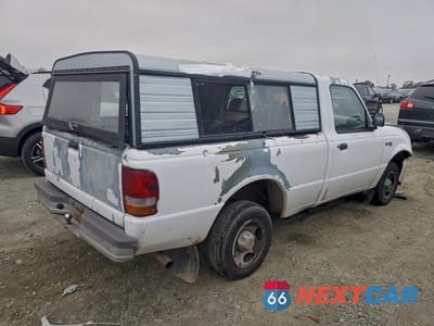 Trzecie zdjęcie samochodu z tyłu: 1997 FORD RANGER VIN:1FTCR10A4VUA16395 - miniatura