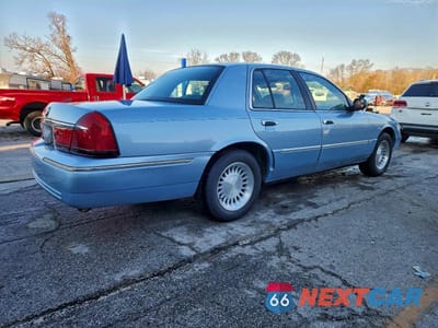 Trzecie zdjęcie samochodu z tyłu: 2000 MERCURY GRAND MARQUIS LS VIN:2MEFM75W1YX666235 - miniatura