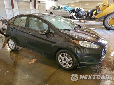 Czwarte zdjęcie samochodu z boku: 2014 FORD FIESTA SE VIN:3FADP4BJ2EM102226 - miniatura
