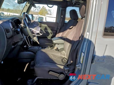 Zdjęcie 7 z 12 samochodu: 2015 JEEP WRANGLER UNLIMITED SPORT VIN:1C4BJWDG2FL622509 - miniatura