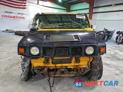 Piąte zdjęcie samochodu w środku: 2003 HUMMER H2 VIN:5GRGN23UX3H144072 - miniatura
