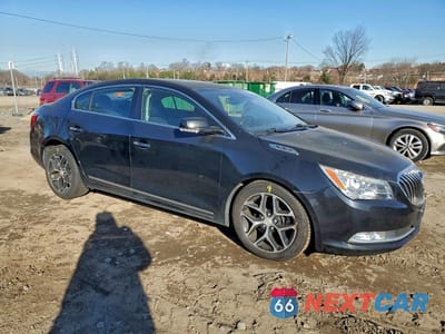 Czwarte zdjęcie samochodu z boku: 2016 BUICK LACROSSE SPORT TOURING VIN:1G4G45G30GF193625 - miniatura