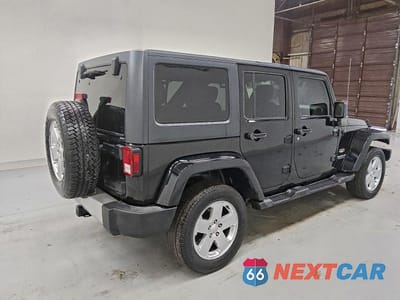 Trzecie zdjęcie samochodu z tyłu: 2012 JEEP WRANGLER UNLIMITED SAHARA VIN:1C4HJWEG7CL113939 - miniatura