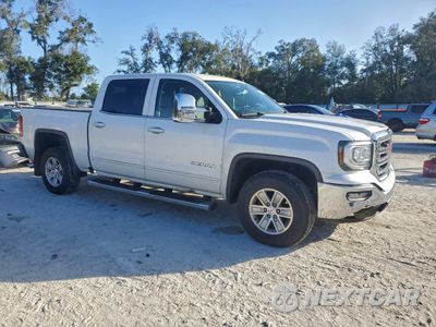 Czwarte zdjęcie samochodu z boku: 2018 GMC SIERRA C1500 SLE VIN:3GTP1MEC5JG226781 - miniatura