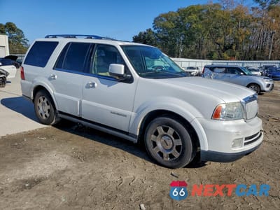 Czwarte zdjęcie samochodu z boku: 2005 LINCOLN NAVIGATOR VIN:5LMFU28505LJ10247 - miniatura