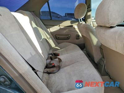 Zdjęcie 10 z 15 samochodu: 1996 TOYOTA COROLLA DX VIN:1NXBB02E5TZ463496 - miniatura