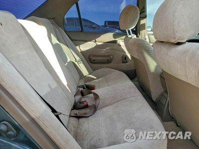 Zdjęcie 10 z 15 samochodu: 1996 TOYOTA COROLLA DX VIN:1NXBB02E5TZ463496 - miniatura