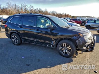 Czwarte zdjęcie samochodu z boku: 2017 HONDA PILOT EXL VIN:5FNYF6H5XHB005207 - miniatura