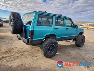 Trzecie zdjęcie samochodu z tyłu: 1996 JEEP CHEROKEE SPORT VIN:1J4FJ68S9TL158852 - miniatura