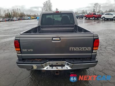 Zdjęcie 6 z 12 samochodu: 1998 MAZDA B4000 CAB PLUS VIN:4F4ZR17X5WTM15836 - miniatura