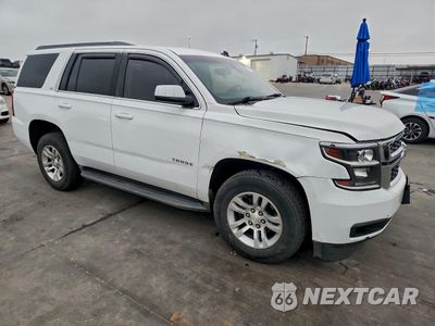 Czwarte zdjęcie samochodu z boku: 2015 CHEVROLET TAHOE C1500 LS VIN:1GNSCAKC9FR204644 - miniatura