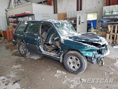 Czwarte zdjęcie samochodu z boku: 1999 SUBARU FORESTER L VIN:JF1SF6355XG739454 - miniatura
