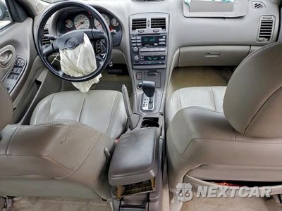 Zdjęcie 8 z 11 samochodu: 2000 NISS MAXIMA GLE VIN:JN1CA31A6YT028448 - miniatura