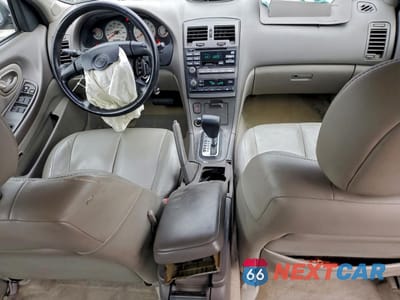 Zdjęcie 8 z 14 samochodu: 2000 NISSAN MAXIMA GLE VIN:JN1CA31A6YT028448 - miniatura