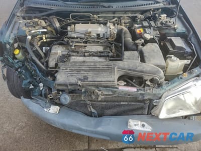Zdjęcie 11 z 14 samochodu: 2000 MAZDA PROTEGE DX VIN:JM1BJ2225Y0218642 - miniatura