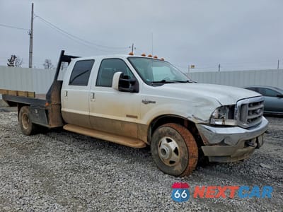 Czwarte zdjęcie samochodu z boku: 2004 FORD F350 SUPER DUTY VIN:1FTWW33P84EC27738 - miniatura