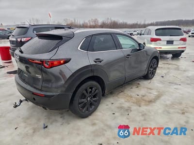 Trzecie zdjęcie samochodu z tyłu: 2022 MAZDA CX-30 PREMIUM VIN:3MVDMBDY1NM430768 - miniatura