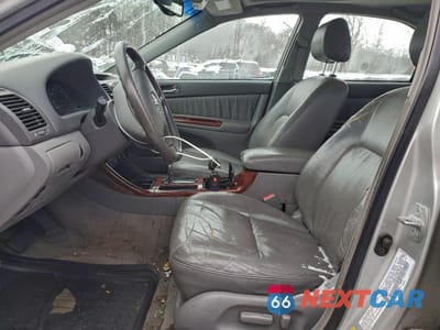 Zdjęcie 7 z 12 samochodu: 2003 TOYOTA CAMRY VIN:4T1BF30K03U061075 - miniatura