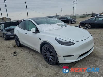 Czwarte zdjęcie samochodu z boku: 2022 TESLA MODEL Y VIN:7SAYGDEFXNF450530 - miniatura