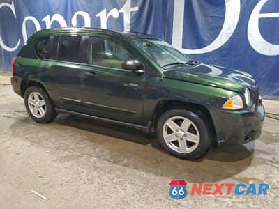 Czwarte zdjęcie samochodu z boku: 2010 JEEP COMPASS SPORT VIN:1J4NT4FBXAD622798 - miniatura