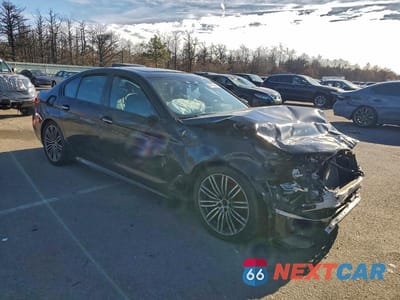 Czwarte zdjęcie samochodu z boku: 2018 BMW M550XI VIN:WBAJB9C56JG464233 - miniatura