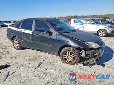 Czwarte zdjęcie samochodu z boku: 2005 FORD FOCUS ZX4 VIN:1FAFP34N25W213457 - miniatura