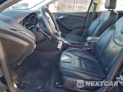 Zdjęcie 7 z 11 samochodu: 2017 FORD FOCUS TITANIUM VIN:1FADP3N20HL219050 - miniatura