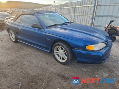 Czwarte zdjęcie samochodu z boku: 1998 FORD MUSTANG GT VIN:1FAFP45X2WF106934 - miniatura