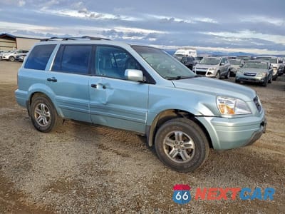 Czwarte zdjęcie samochodu z boku: 2003 HONDA PILOT EXL VIN:2HKYF18633H514531 - miniatura