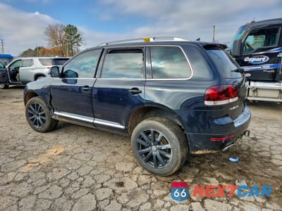 Drugie zdjęcie samochodu z przodu: 2010 VOLKSWAGEN TOUAREG 2 VIN:WVGFK7A94AD004228 - miniatura