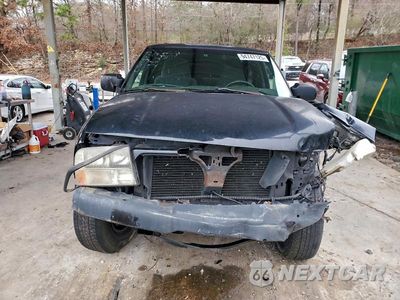 Piąte zdjęcie samochodu w środku: 2001 GMC JIMMY VIN:1GKCS18W31K172328 - miniatura