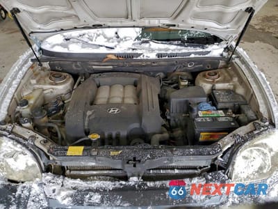 Zdjęcie 12 z 12 samochodu: 2004 HYUNDAI SANTA FE GLS VIN:KM8SC13D44U853676 - miniatura