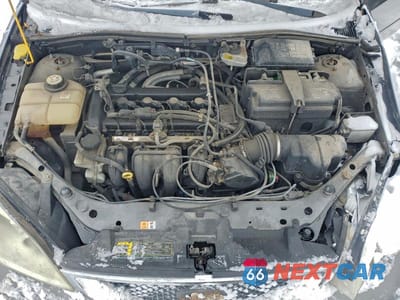 Zdjęcie 11 z 11 samochodu: 2007 FORD FOCUS ZX4 VIN:1FAFP34N57W297003 - miniatura