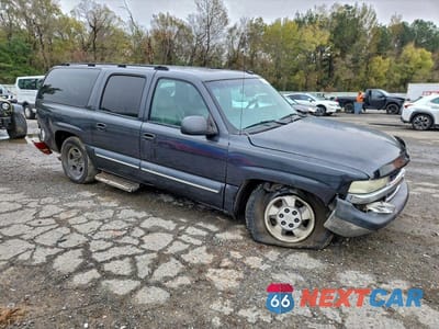 Czwarte zdjęcie samochodu z boku: 2003 CHEVROLET SUBURBAN C1500 VIN:3GNEC16Z13G206251 - miniatura