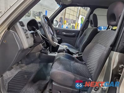 Zdjęcie 7 z 13 samochodu: 2000 TOYOTA RAV4 VIN:JT3HP10V9Y7171577 - miniatura
