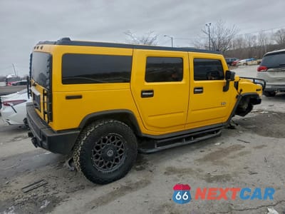 Trzecie zdjęcie samochodu z tyłu: 2003 HUMMER H2 VIN:5GRGN23U23H136418 - miniatura