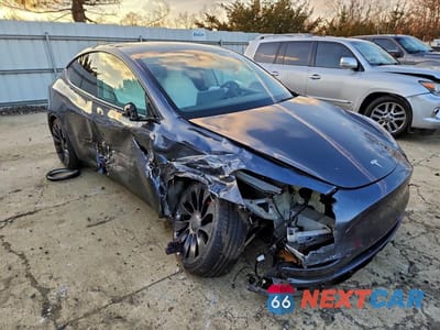Czwarte zdjęcie samochodu z boku: 2022 TESLA MODEL Y VIN:7SAYGDEF0NF441965 - miniatura