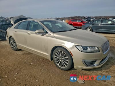 Czwarte zdjęcie samochodu z boku: 2017 LINCOLN MKZ SELECT VIN:3LN6L5C92HR665238 - miniatura