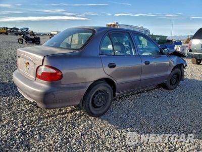 Trzecie zdjęcie samochodu z tyłu: 1999 HYUNDAI ACCENT GL VIN:KMHVF24NXXU560404 - miniatura